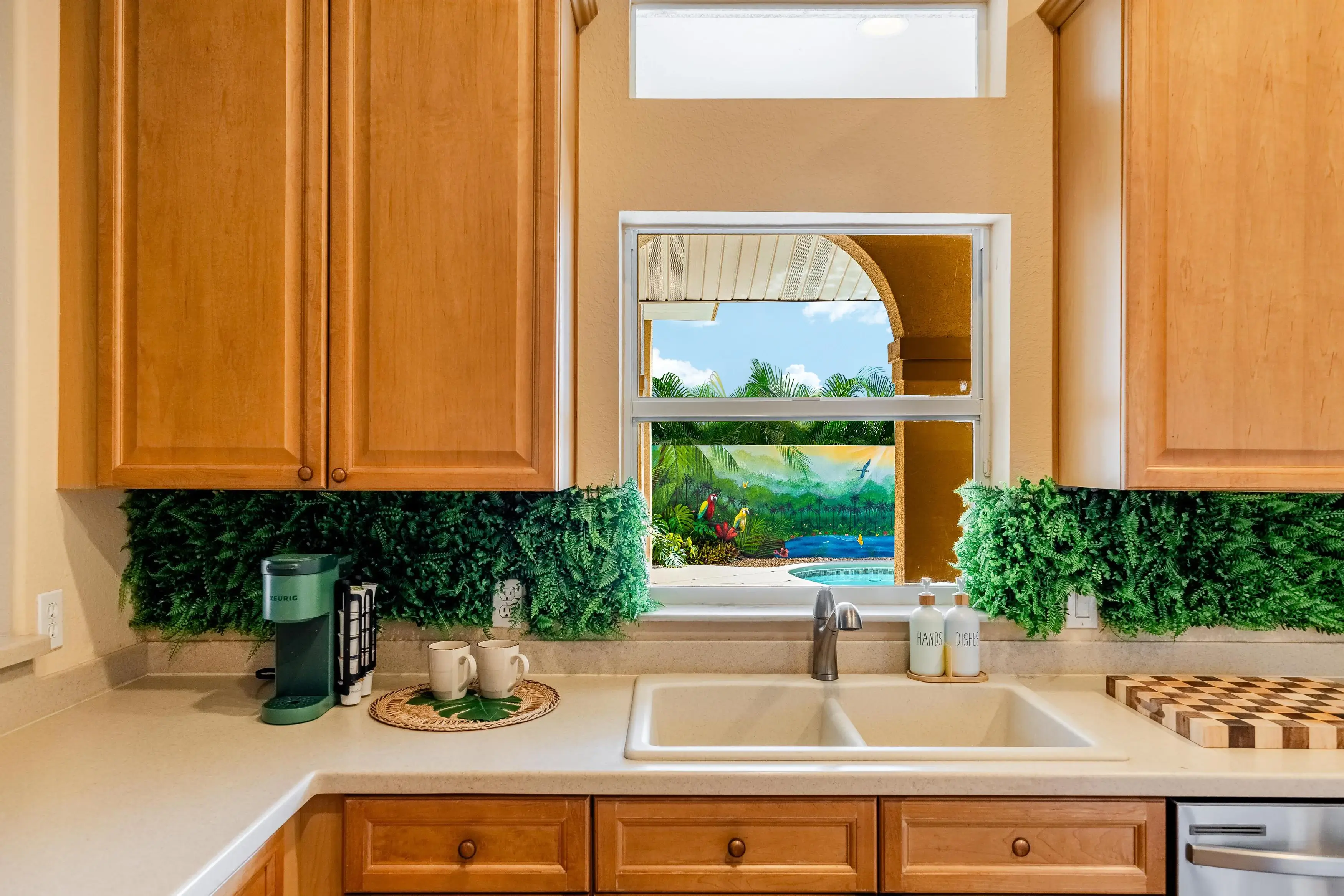Enjoy stunning views of nature from the kitchen window, bringing the beauty of the outdoors inside.
